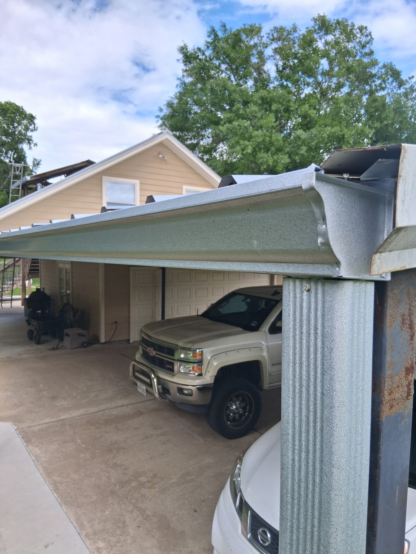 Custom Galvalume gutter installation by Boone's Gutter Services